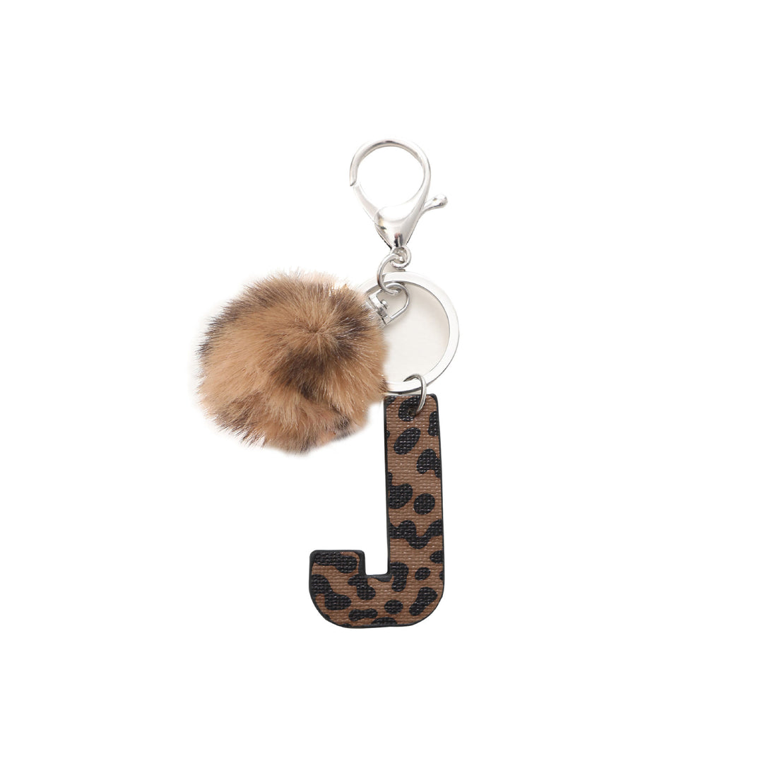Portachiavi in pelle con lettera stampata leopardata in stile western e palla di peluche - J - image 11
