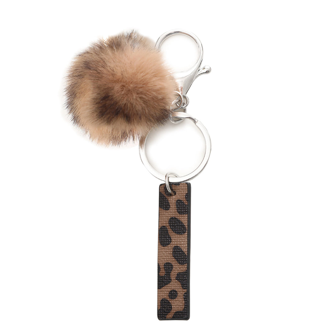 Portachiavi in pelle con lettera stampata leopardata in stile western e palla di peluche - I - image 11