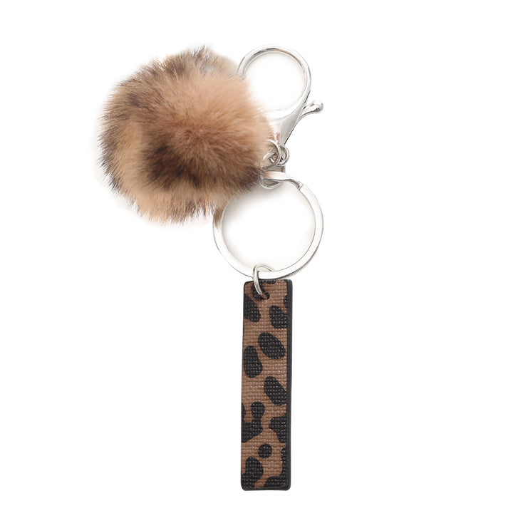 Portachiavi in pelle con lettera stampata leopardata in stile western e palla di peluche - I - image 11