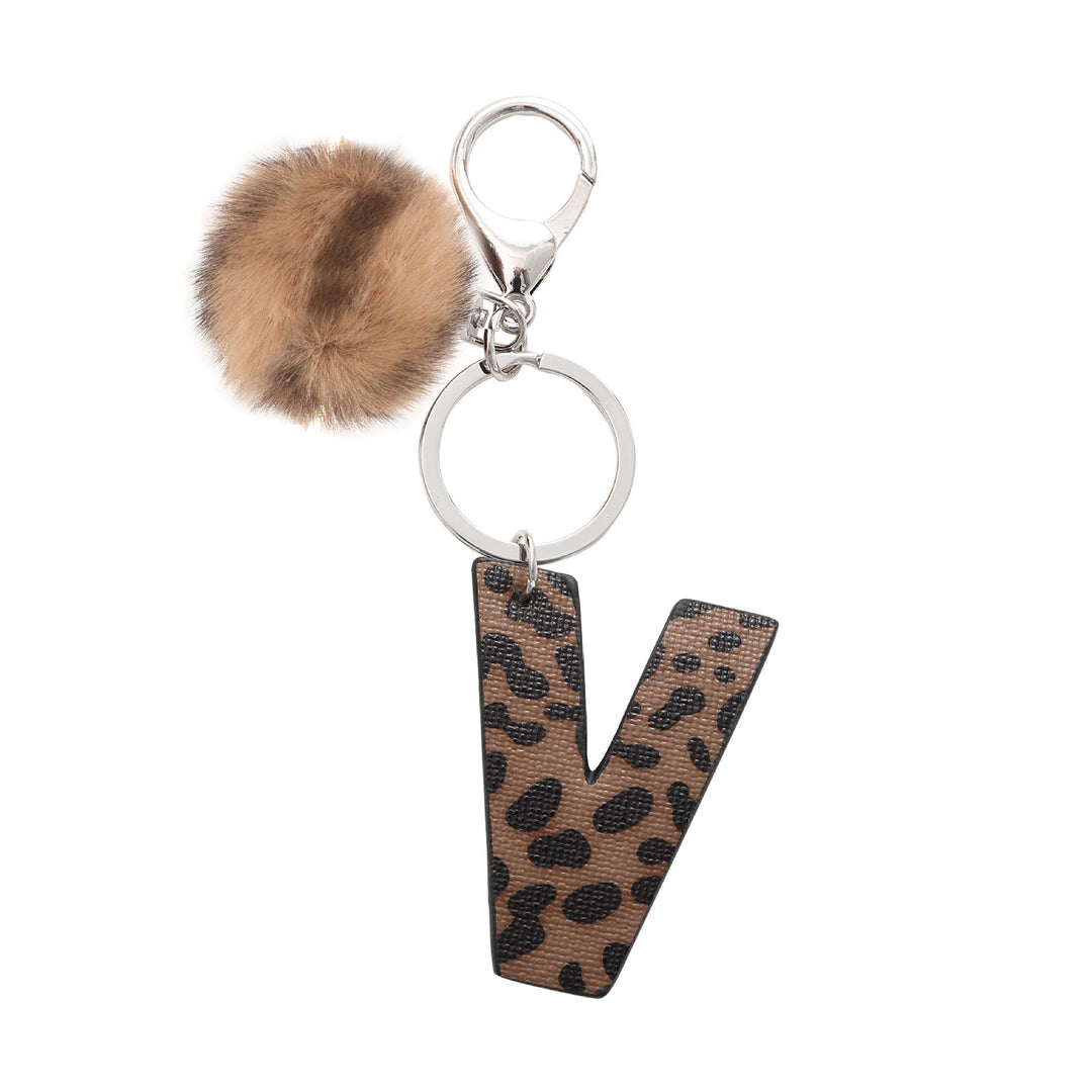 Portachiavi in pelle con lettera stampata leopardata in stile western e palla di peluche - V - image 23