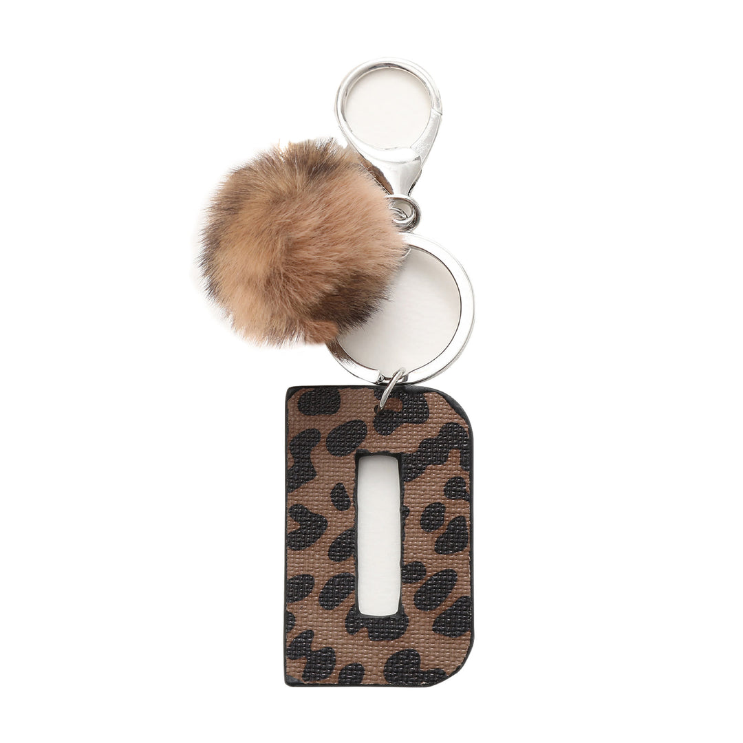 Portachiavi in pelle con lettera stampata leopardata in stile western e palla di peluche - D - image 5