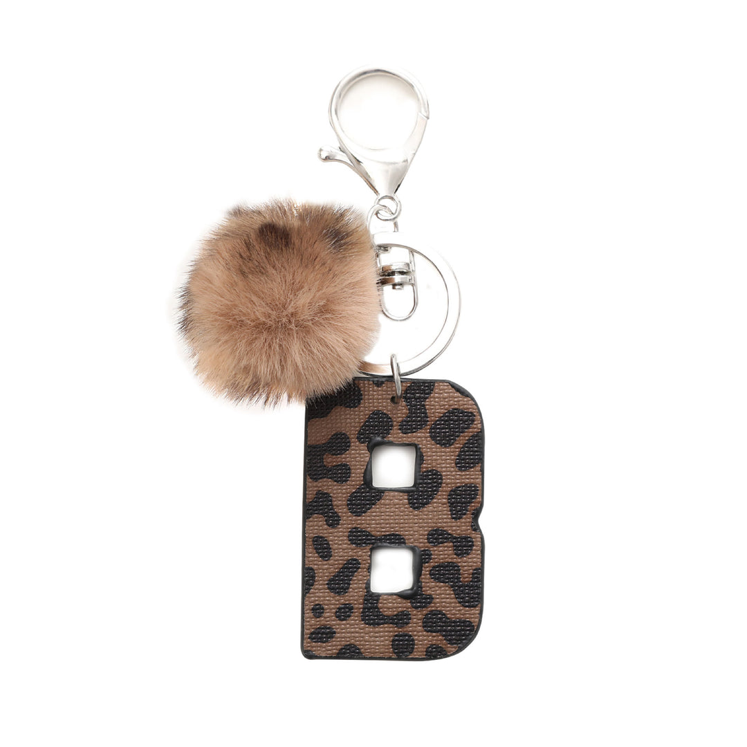 Portachiavi in pelle con lettera stampata leopardata in stile western e palla di peluche - B - image 3