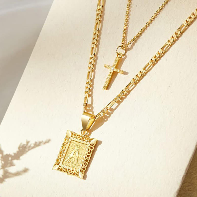 Collana con doppia catena cava con lettera quadrata dorata e croce - image 0