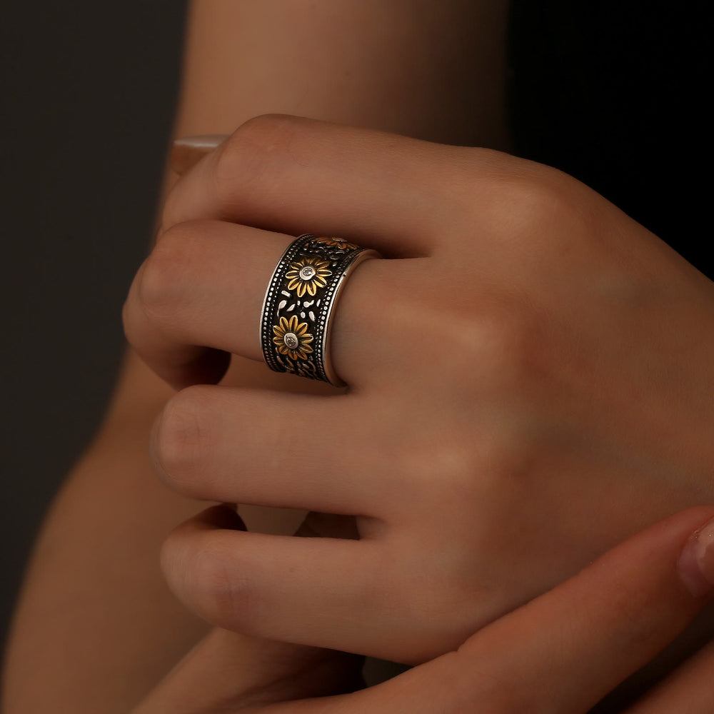 Anello regolabile con fiore tinto nero in argento retrò - image 1