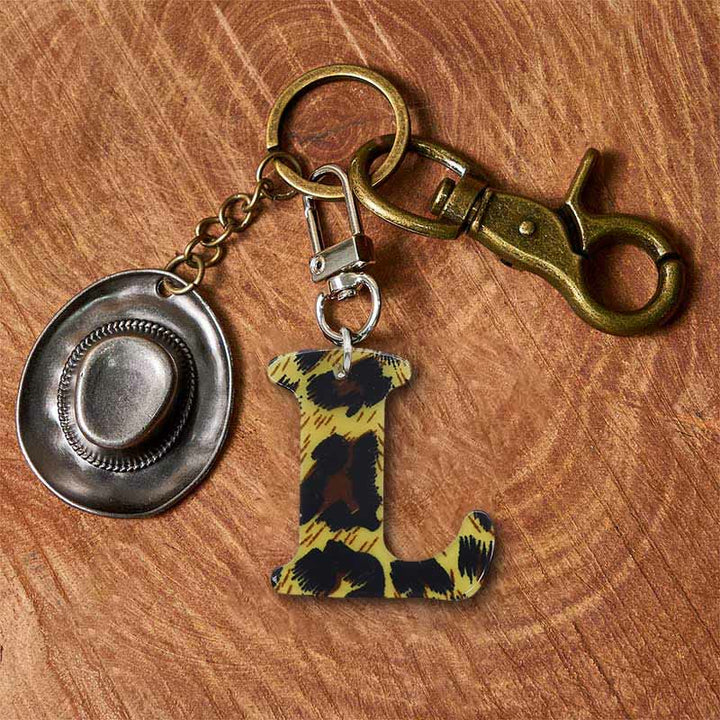 Portachiavi con ciondolo a forma di lettera con stampa leopardata e cappello da cowboy - Portachiavi in ottone + cappello in argento - L - image 19