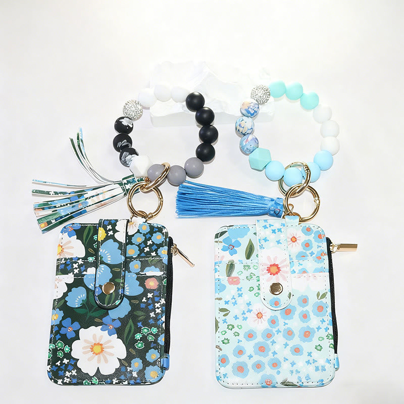 Portafoglio con bracciale e stampa floreale in stile colorato e naturale - image 0