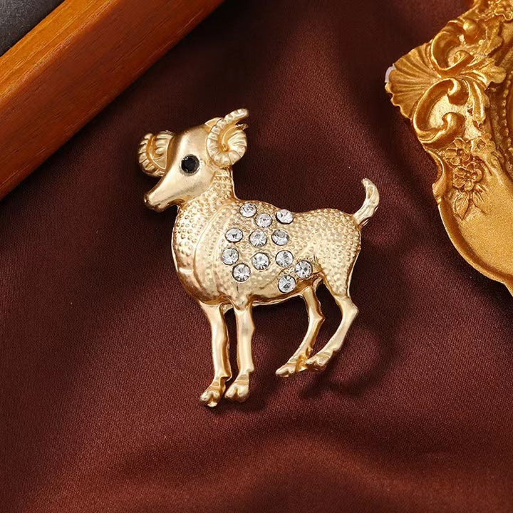 Spilla in oro con diamanti e segno zodiacale - image 2