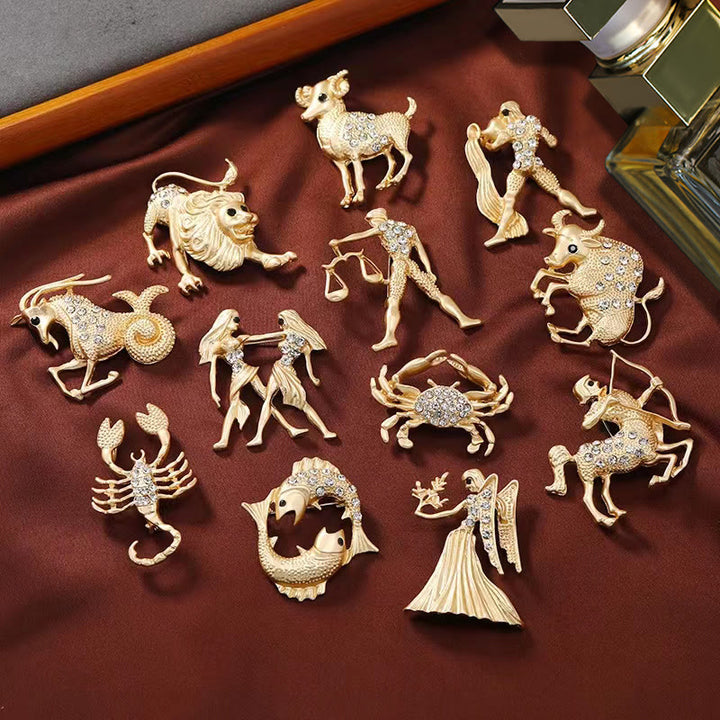 Spilla in oro con diamanti e segno zodiacale - image 0