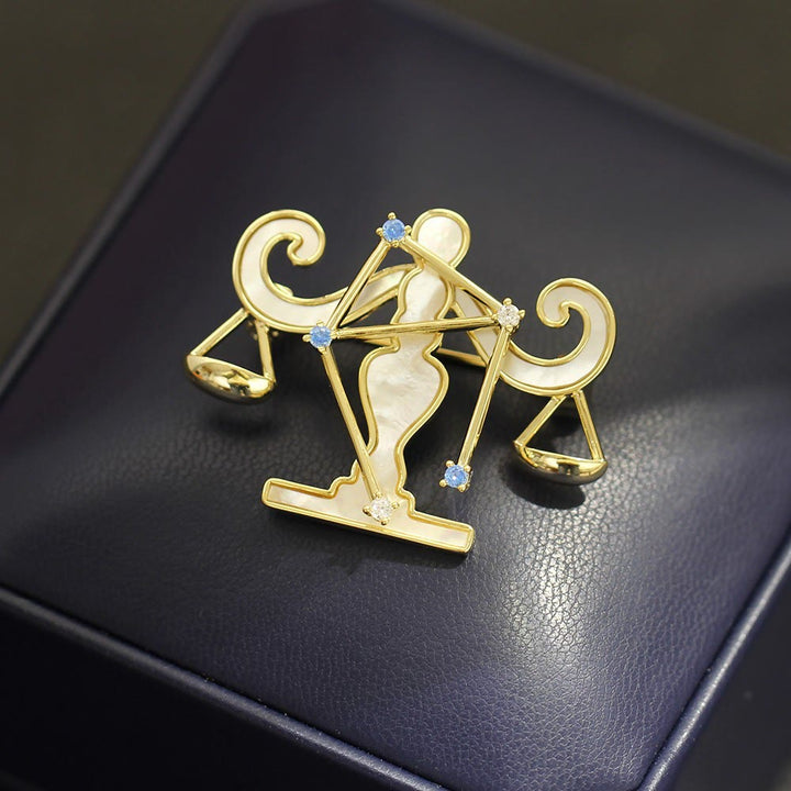 Spilla in oro con 12 costellazioni in madreperla e cristallo blu - image 13