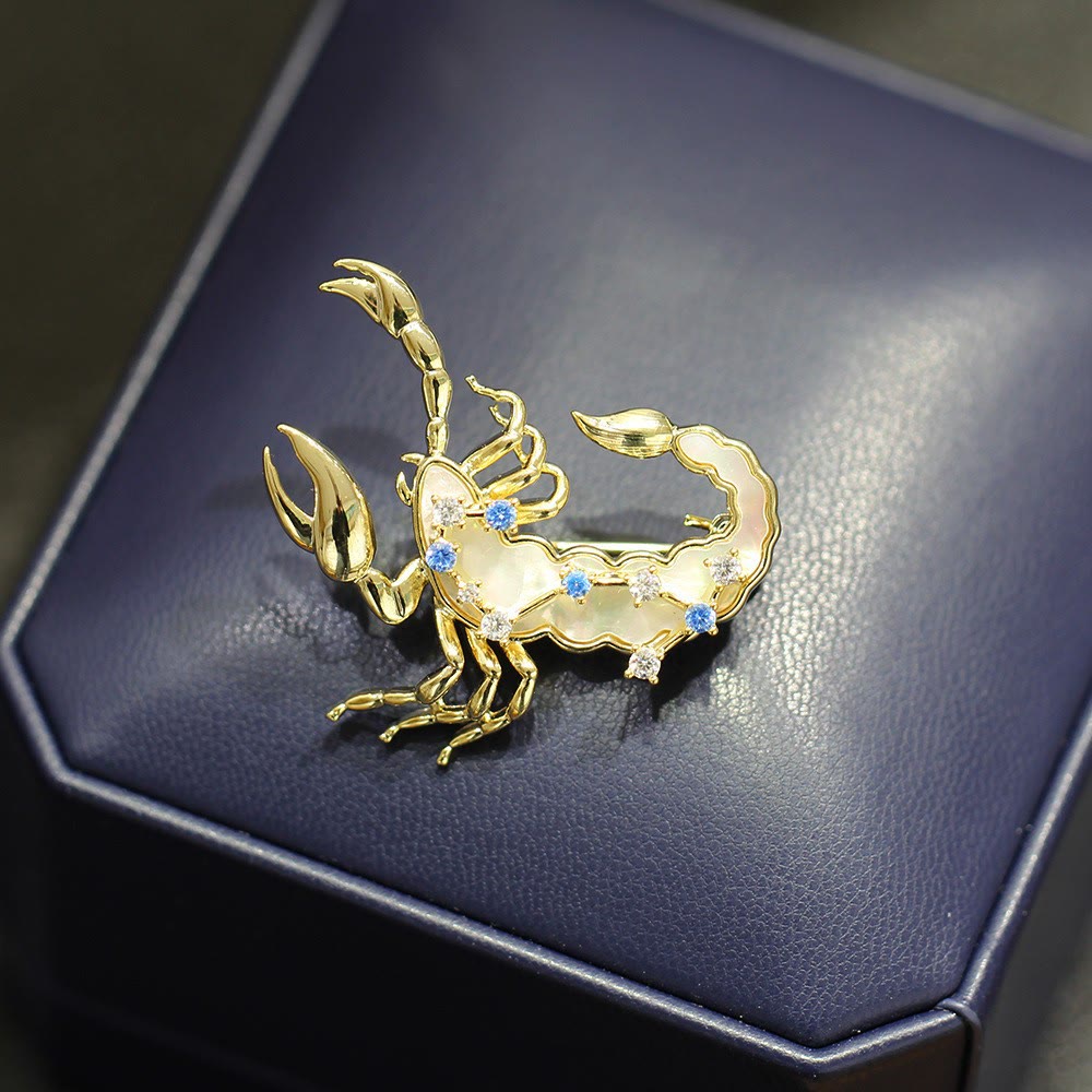 Spilla in oro con 12 costellazioni in madreperla e cristallo blu - image 15
