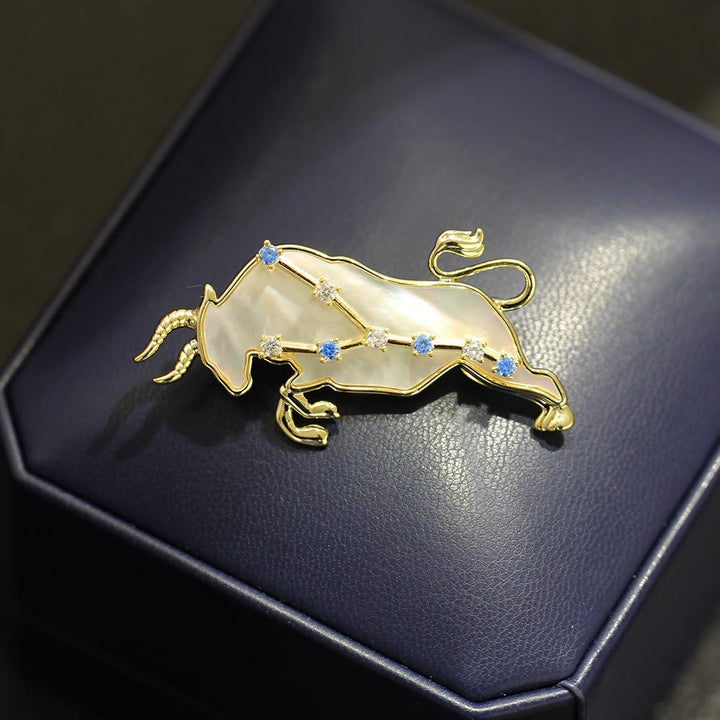 Spilla in oro con 12 costellazioni in madreperla e cristallo blu - image 3