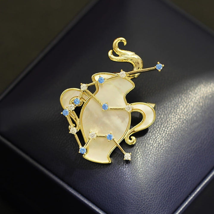 Spilla in oro con 12 costellazioni in madreperla e cristallo blu - image 20