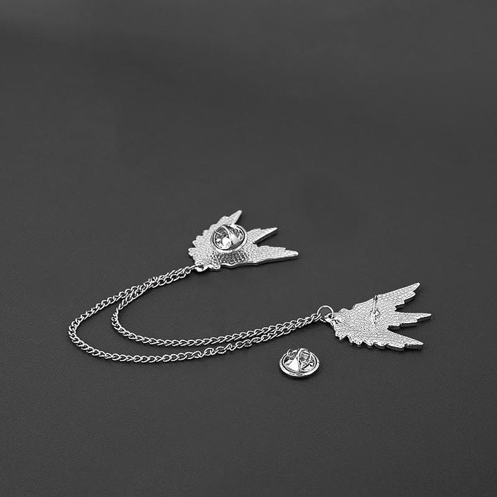 Spilla a doppia catena con coppia di ali simmetriche e ornate - image 4