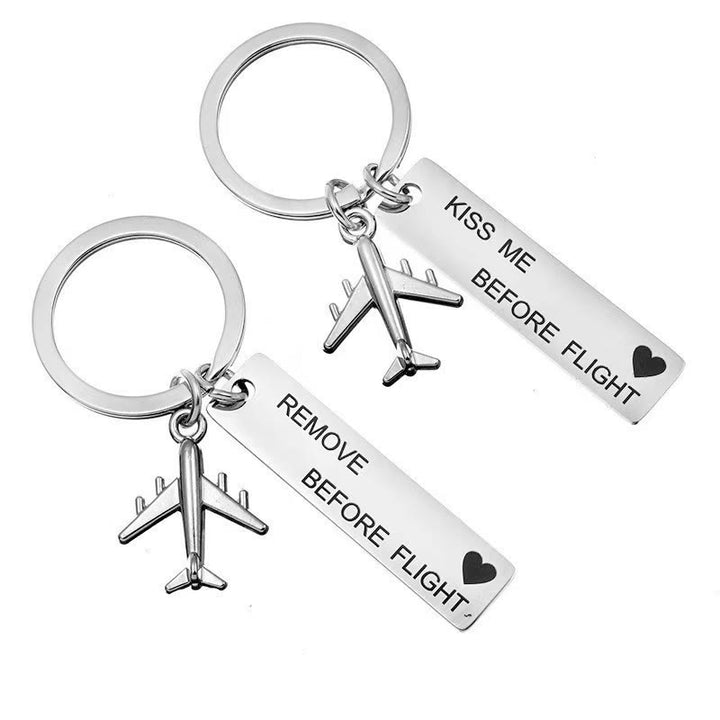 Portachiavi personalizzato con testo inciso a forma di mini aeroplano - image 0
