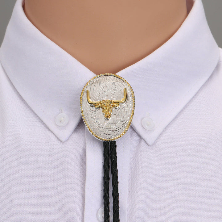 Cravatta Bolo Western Retro con testa di toro dorata e placcata in argento - Pesce gatto dorato - image 0