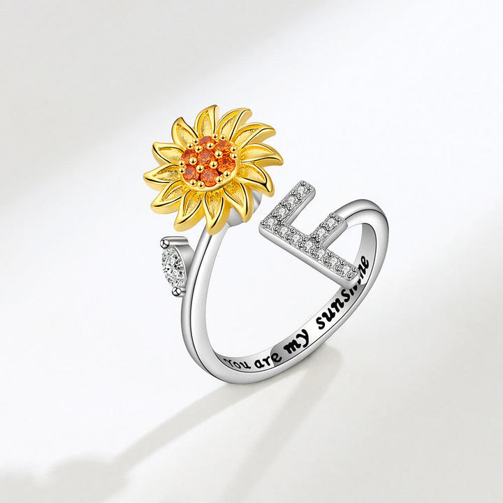 Anello regolabile con iniziale a forma di girasole rotante Anxiery - F - image 6