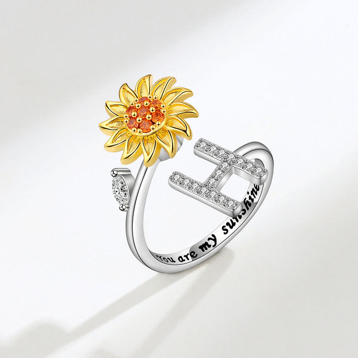 Anello regolabile con iniziale a forma di girasole rotante Anxiery - H - image 8