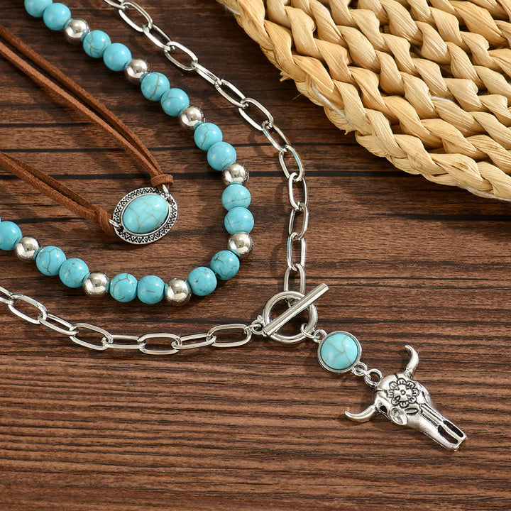 Collana in stile occidentale con ciondolo a forma di teschio di mucca in argento e perlina turchese - image 3