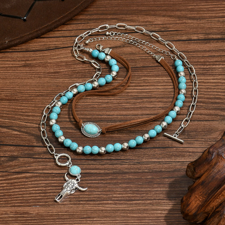 Collana in stile occidentale con ciondolo a forma di teschio di mucca in argento e perlina turchese - image 2