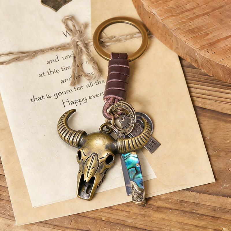 Portachiavi con coltello pieghevole a forma di testa di toro retrò e texture a conchiglia - image 1