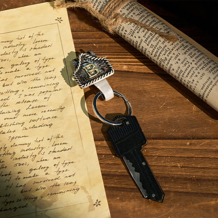 Portachiavi con lettera retrò western e coltello a forma di chiave - image 2