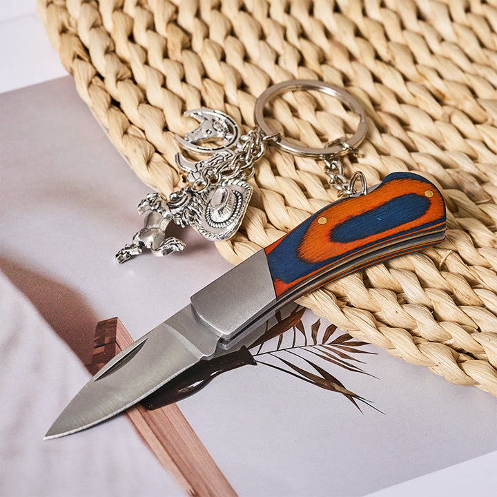 Portachiavi con coltello pieghevole effetto legno, cavallo argentato e cappello da cowboy - Argento - image 0