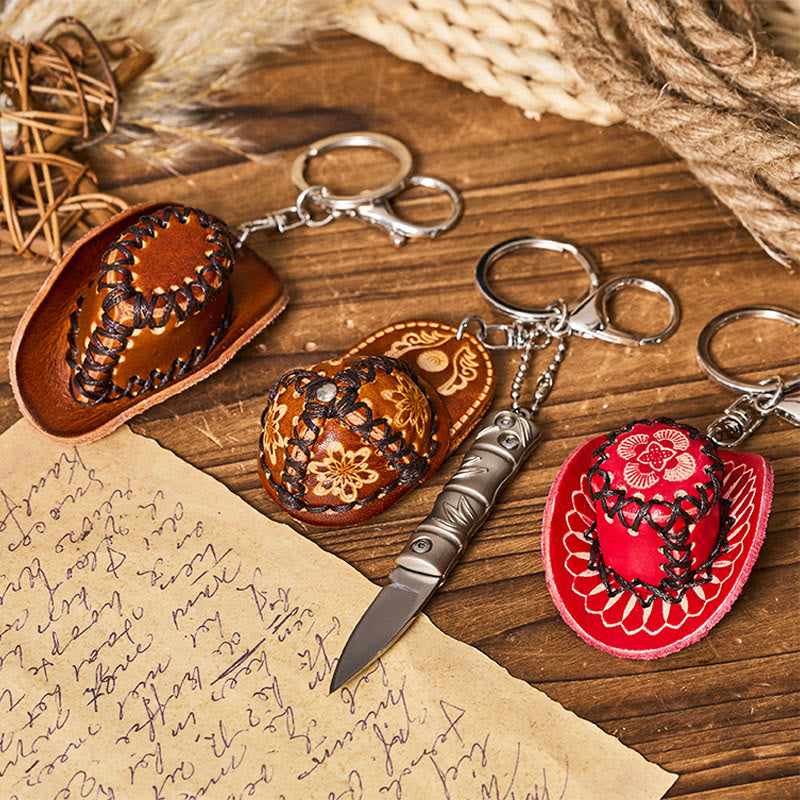 Portachiavi con ciondolo a forma di cappello da cowboy con coltello pieghevole in argento occidentale - image 0