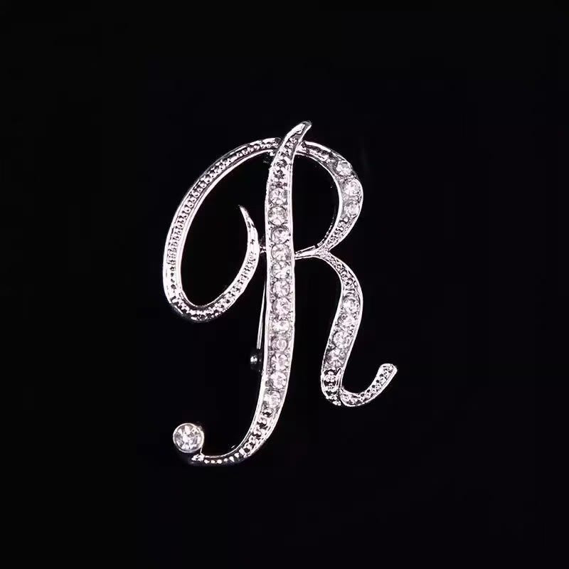 Spilla con iniziale in oro e argento e diamanti intarsiati - Argento - R - image 40