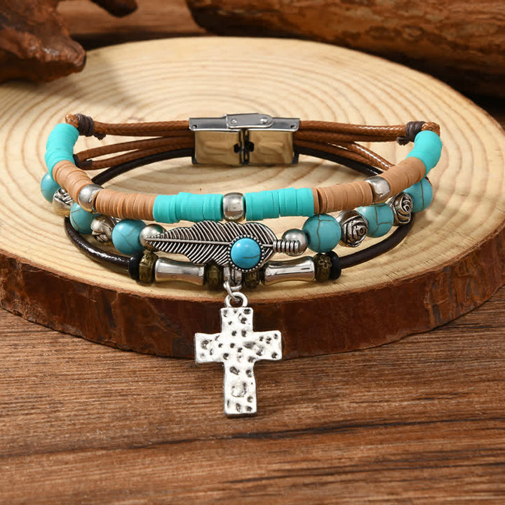 Bracciale in pelle a strati con piume turchesi e croce - image 3