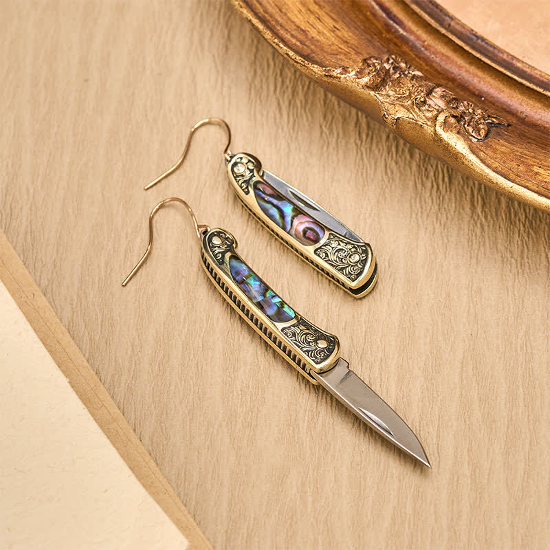 Orecchini a forma di coltellino tascabile in abalone iridescente, realizzati artigianalmente. - image 4