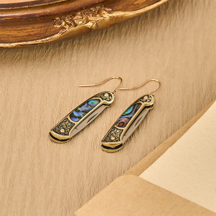 Orecchini a forma di coltellino tascabile in abalone iridescente, realizzati artigianalmente. - image 5
