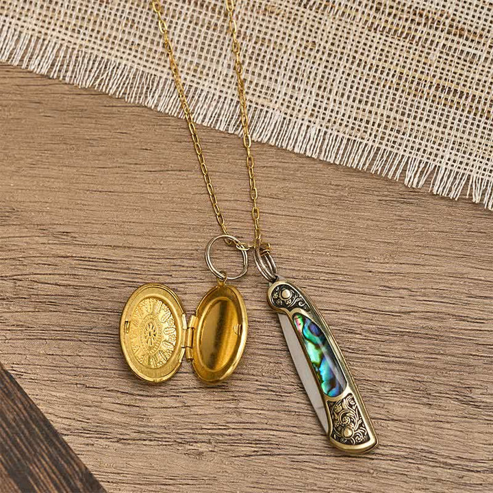 Collana con doppio ciondolo audace in abalone, composto da coltello e medaglione portafoto. - image 3