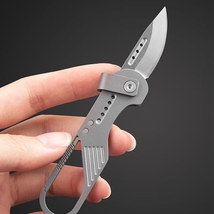Coltello pieghevole in stile titanio, strumento EDC con moschettone - image 2