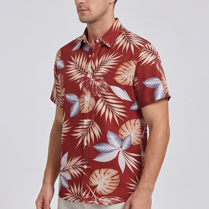 Camicia da uomo a maniche corte con stampa di foglie tropicali rosso acceso, ideale per le vacanze. - image 2