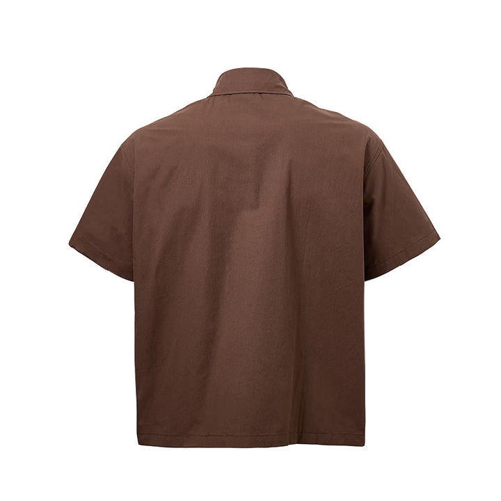 Camicia oversize a maniche corte marrone scuro con ricami laterali. - image 9
