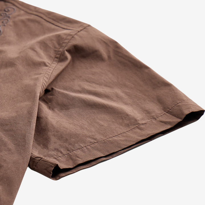Camicia oversize a maniche corte marrone scuro con ricami laterali. - image 7