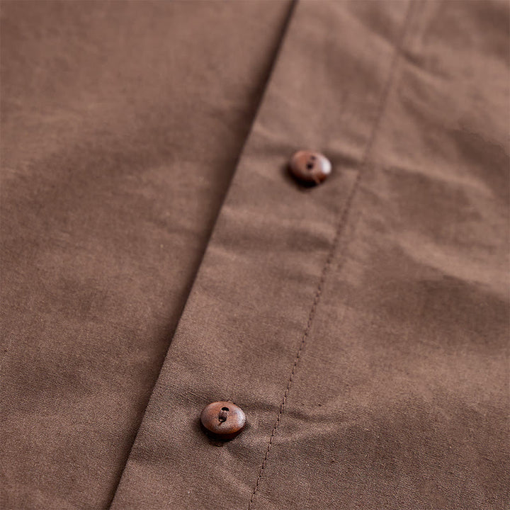 Camicia oversize a maniche corte marrone scuro con ricami laterali. - image 5