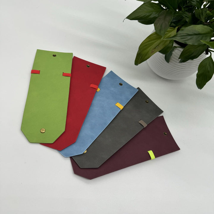 Portafoglio minimalista in pelle con chiusura a scatto, ideale per l'uso quotidiano. - image 6