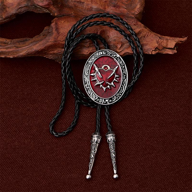 Cravatta bolo ovale vintage con motivo a proiettile a forma di cuore e spina rossa. - image 1