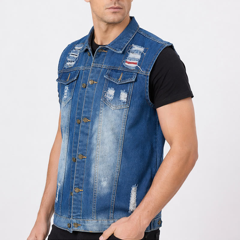 Gilet in denim slavato blu effetto consumato con applicazioni. - image 3