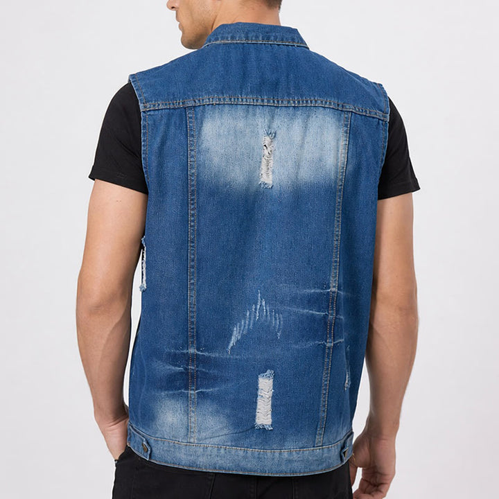 Gilet in denim slavato blu effetto consumato con applicazioni. - image 2