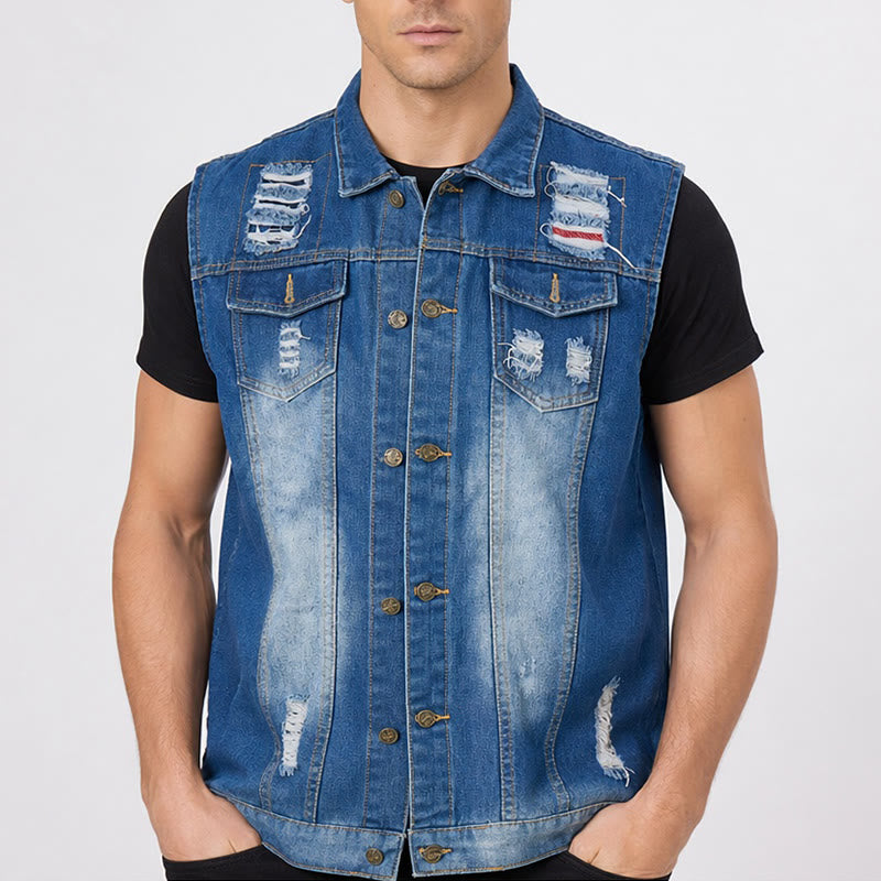 Gilet in denim slavato blu effetto consumato con applicazioni. - image 1