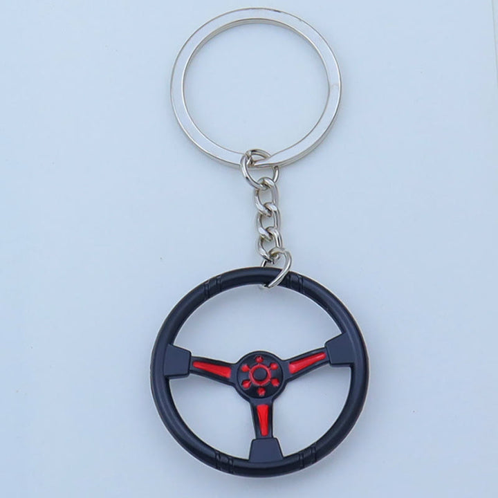 Collezione di portachiavi con design di mini auto moderne - Volante rosso - image 14