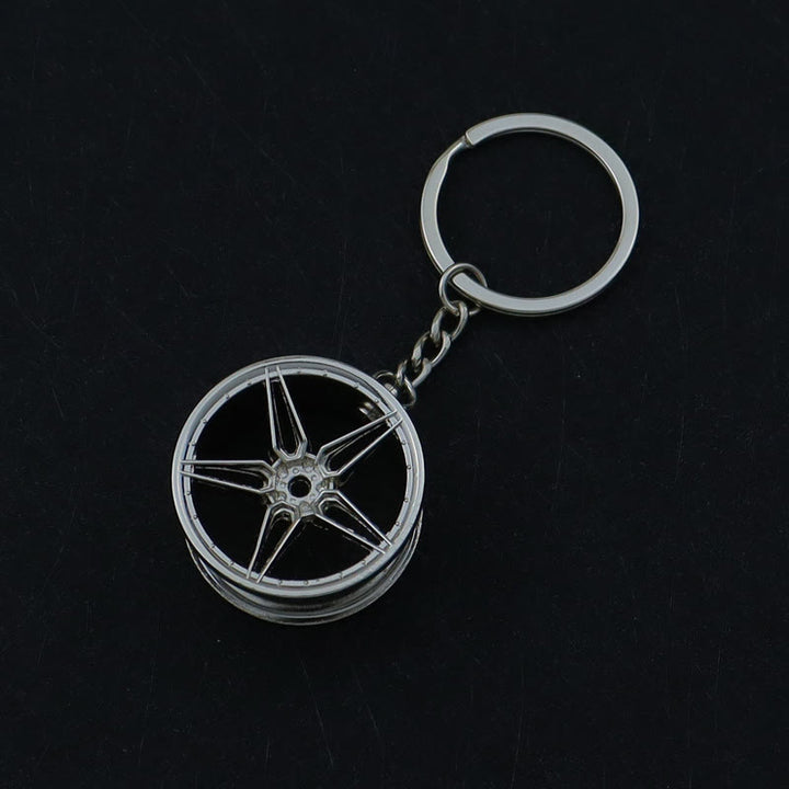 Collezione di portachiavi con design di mini auto moderne - Grande Ruota d'Argento - image 13