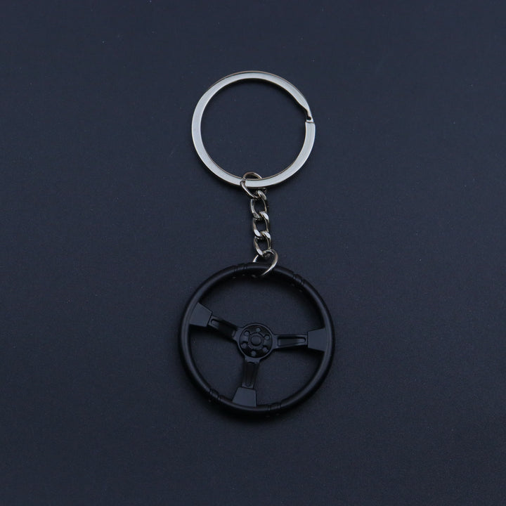 Collezione di portachiavi con design di mini auto moderne - Volante nero - image 19