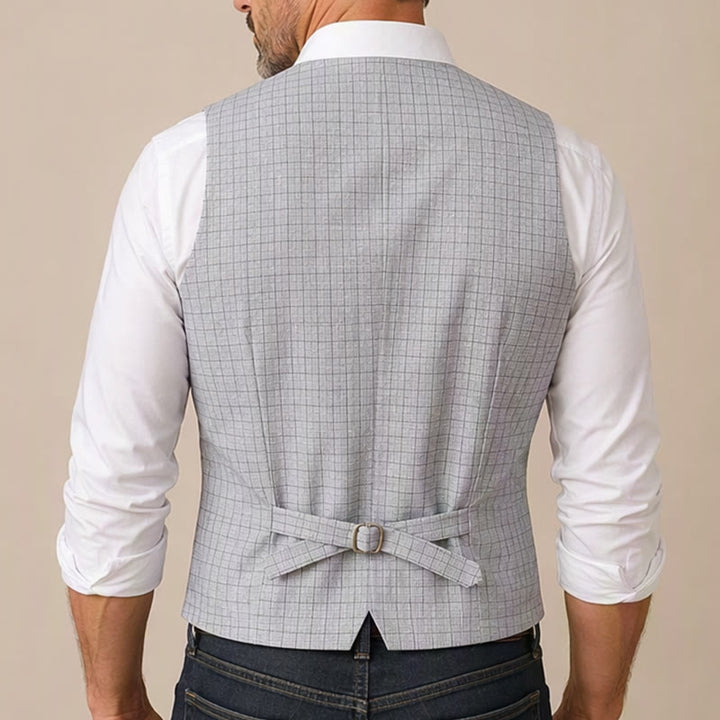 Gilet minimalista con scollo a V e motivo a griglia grigio argento. - image 2