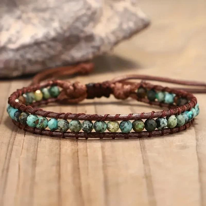 Delicato bracciale avvolgente intrecciato in stile boho con perline turchesi, regolabile. - Turchese - image 0