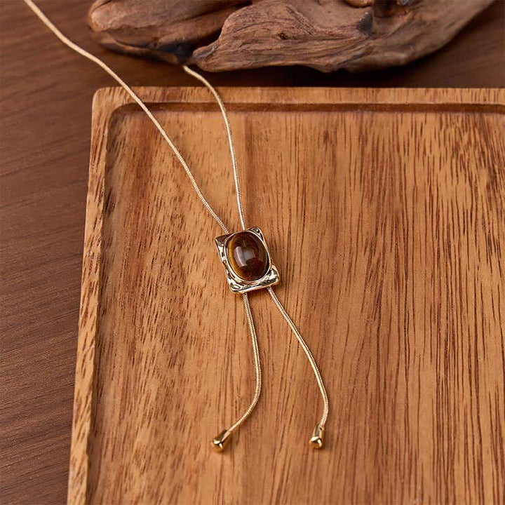 Collana Bolo con ciondolo scorrevole quadrato in occhio di tigre, a forma di Y, con laccio e bolo - Oro - image 0