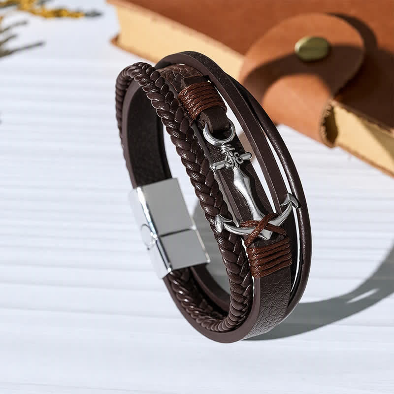 Bracciale in pelle con ancora nautica e chiusura regolabile a scatto, con bottone a pressione. - Caffè - image 0