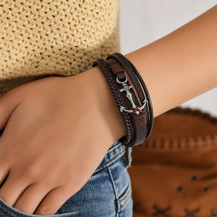 Bracciale in pelle con ancora nautica e chiusura regolabile a scatto, con bottone a pressione. - image 1
